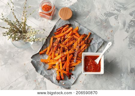 Sweet potato fries on table