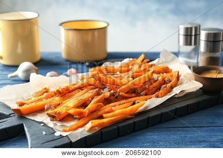 Sweet potato fries on table