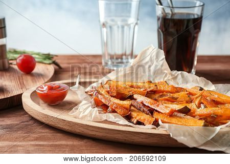 Sweet potato fries on table