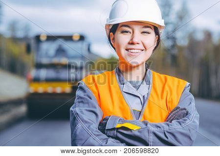 female worker road construction infrastructure repair pavement