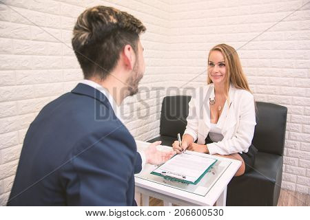 Business employer offering work to new employee extend agreement for signing to successful applicant hiring new staff concept assignment job placement terms of employment vacancy and getting job