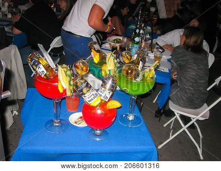 Miami, USA - January 01, 2014: The people drinking colourful drinks or coctails at Miami Beach, USA on January 01, 2014