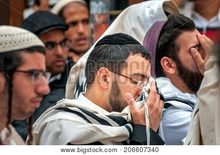 Prayer. Hasids pilgrims in traditional clothes. Uman Ukraine - September 21 2017: Rosh-ha-Shana festival Jewish New Year.
