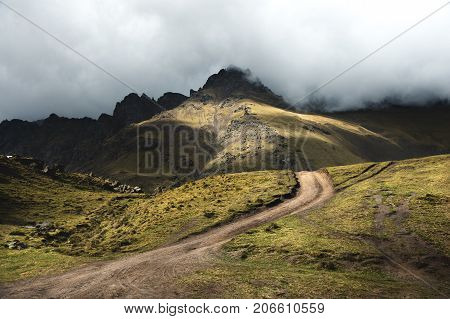 A beautiful morning landscape of mountain serpentine passing in the mountain gorge in the autumn