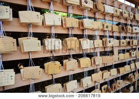 TOKYO, JAPAN - MAY 15: Many wooden of Votive Tablets at Meiji Shrine in Tokyo, Japan