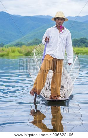 INLE LAKE MYANMAR - SEP 07 : Burmese fisherman at Inle lake Myanmar on September 07 2017 inle Lake is a freshwater lake located in Shan state