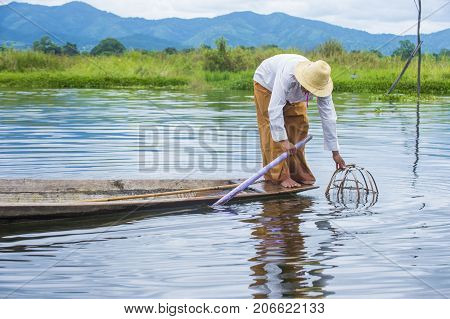 INLE LAKE MYANMAR - SEP 07 : Burmese fisherman at Inle lake Myanmar on September 07 2017 inle Lake is a freshwater lake located in Shan state