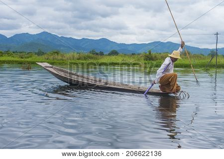 INLE LAKE MYANMAR - SEP 07 : Burmese fisherman at Inle lake Myanmar on September 07 2017 inle Lake is a freshwater lake located in Shan state