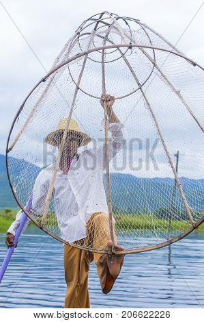 INLE LAKE MYANMAR - SEP 07 : Burmese fisherman at Inle lake Myanmar on September 07 2017 inle Lake is a freshwater lake located in Shan state