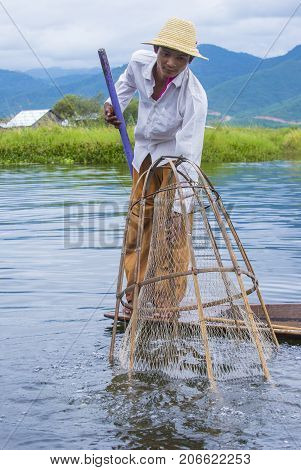 INLE LAKE MYANMAR - SEP 07 : Burmese fisherman at Inle lake Myanmar on September 07 2017 inle Lake is a freshwater lake located in Shan state