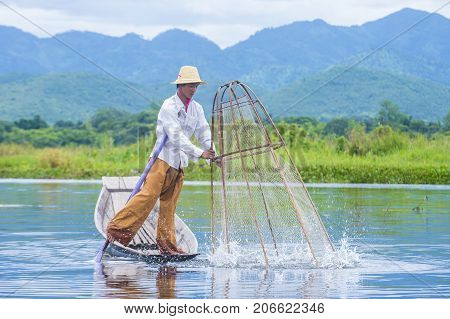 INLE LAKE MYANMAR - SEP 07 : Burmese fisherman at Inle lake Myanmar on September 07 2017 inle Lake is a freshwater lake located in Shan state