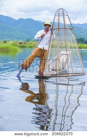 INLE LAKE MYANMAR - SEP 07 : Burmese fisherman at Inle lake Myanmar on September 07 2017 inle Lake is a freshwater lake located in Shan state