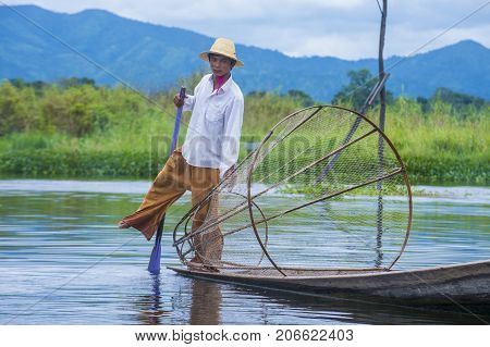 INLE LAKE MYANMAR - SEP 07 : Burmese fisherman at Inle lake Myanmar on September 07 2017 inle Lake is a freshwater lake located in Shan state