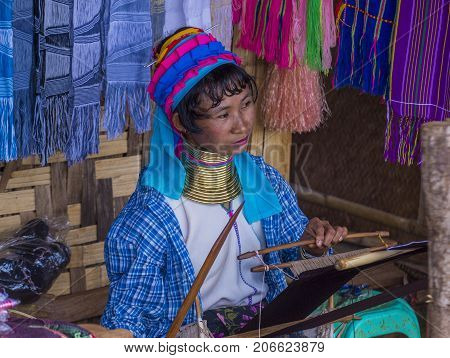 KAYAN STATE MYANMAR - SEP 09 : Portrait of Kayan tribe woman in Kayan state Myanmar on September 09 2017 Kayan tribe woman are well known for wearing neck rings.