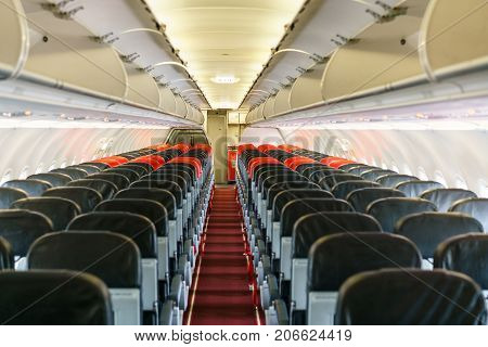 Empty passengers inside low cost airplane after plane landing