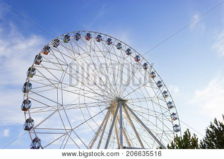A Colourful Ferris Wheel. Front View