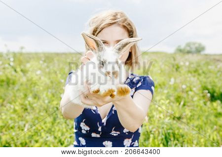 Young Girl With A Little Rabbit.