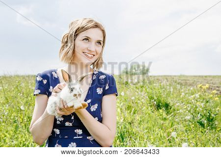 Young Girl With A Little Rabbit.