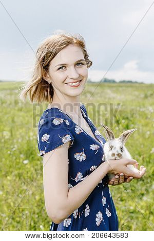 Young Girl With A Little Rabbit.