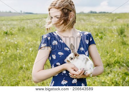 Young Girl With A Little Rabbit.
