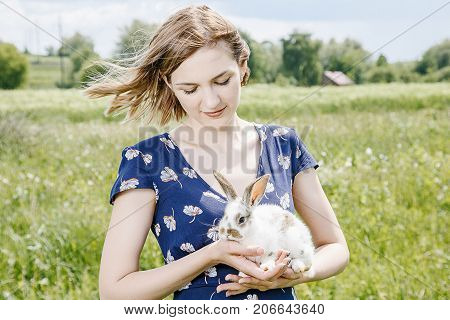 Young Girl With A Little Rabbit.