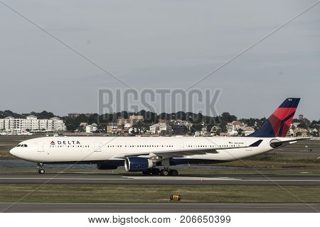 Boston, Massachusetts USA 23.09.2017 - Delta Airlines jet planes driving to terminal gates at Logan Airport