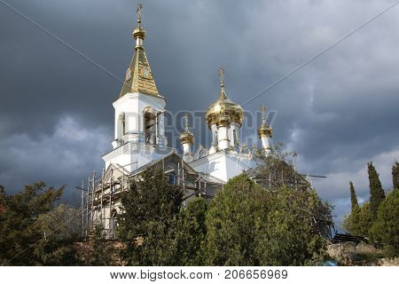 Church against the sky. Under Full Restoration