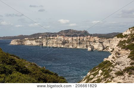 Town Of Bonifacio Clinging To The Cliffs In Corsica