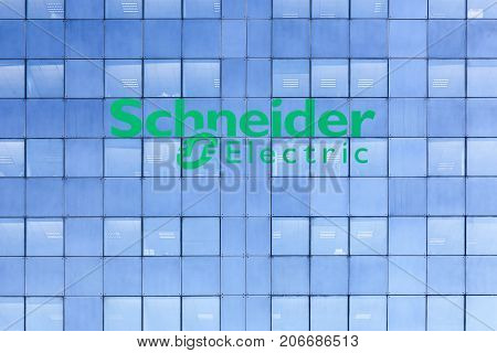 Grenoble, France - June 25, 2017: Schneider Electric building with the logo on a facade. Schneider Electric is a European multinational corporation, leader in automation and electricity management