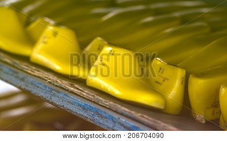 yellow plastic shoe lastform prepare in the shelf of footwear factory