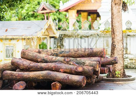 A pile of firewood in the courtyard of the temple Wat Sensoukaram in Louangphabang Laos. Close-up