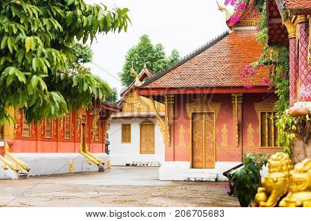 View Of The Courtyard Of The Wat Sensoukaram Temple In Louangphabang, Laos. Copy Space For Text.