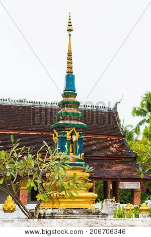 Pagoda in the temple Wat Sensoukaram in Louangphabang Laos. Vertical. Copy space for text