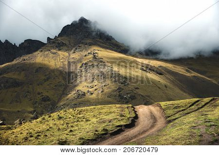 A beautiful morning landscape of mountain serpentine passing in the mountain gorge in the autumn