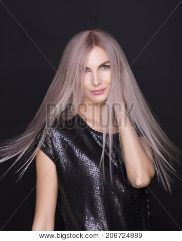 Photo of young beautiful woman with magnificent purple hair