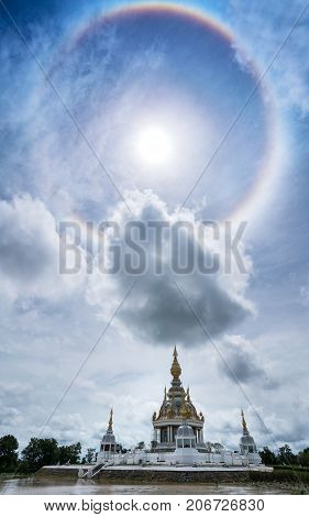 Magnificent Wat Thung Setthi (The Great Jewel Chedi of the three worlds) with amazing sun halo Khon Kaen thailand