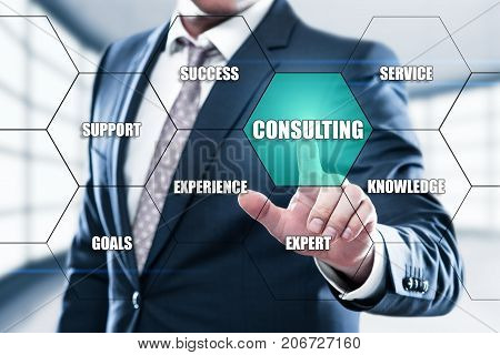 Consulting Expert Advice Support concept on the hexagons and transparent honeycomb structure presentation screen. Man pressing button on display with word in modern office