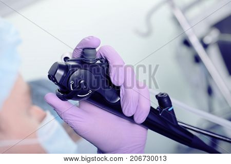 Medical Doctor's Hand With An Endoscopic Probe