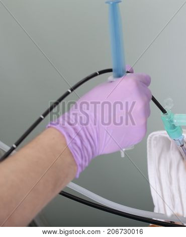 Doctors Hand During The Medical Pocedure. Macro Photo