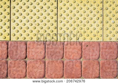 Tactile Paving Slabs Texture . Blind way.Traffic route for blind peoples