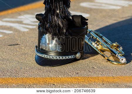 a Shako gauntlet and trumpet waiting to perform