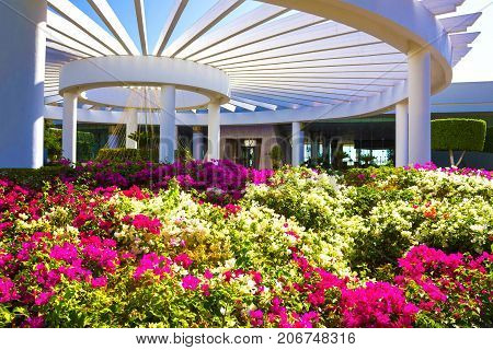 Sharm El Sheikh, Egypt - September 26, 2017: The main entrance and flowers at Monter Carlo Sharm Resort and SPA at Sharm El Sheikh, Egypt on September 26, 2017