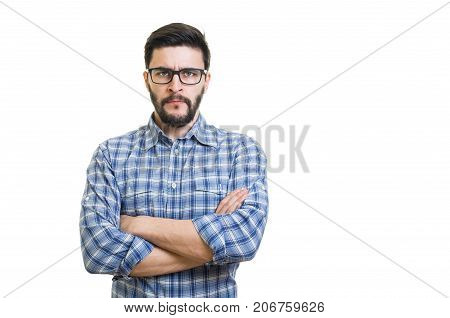 Serious bearded man portrait with rolled sleeves