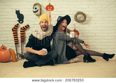 Halloween Man Smiling In Scarf And Yellow Cap