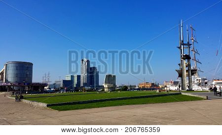 Gdynia, Poland - October 01, 2017: People visit Kosciuszko Square - representation places in Gdynia, on the background of the city of Gdynia, Poland.