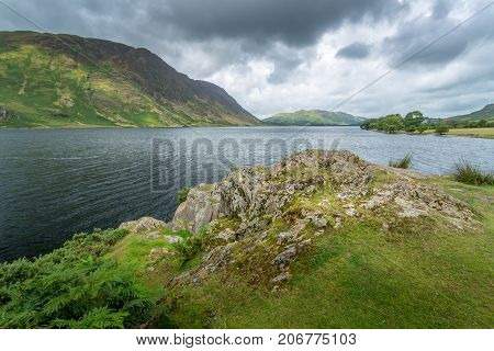 A landscape view of Crummock Water one of the lakes in the Lake District Cumbria United Kingdom.