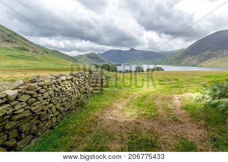 A landscape view of Crummock Water one of the lakes in the Lake District Cumbria United Kingdom.
