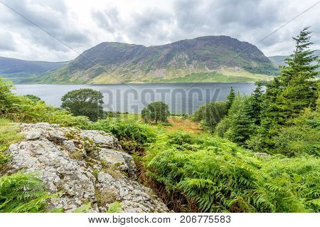 A landscape view of Crummock Water one of the lakes in the Lake District Cumbria United Kingdom.
