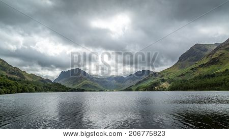 A landscape view of Buttermere one of the lakes in the Lake District Cumbria United Kingdom.