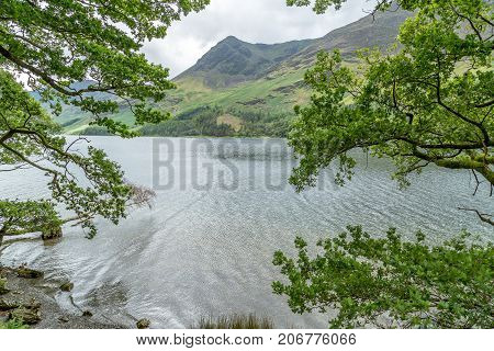A landscape view of Buttermere one of the lakes in the Lake District Cumbria United Kingdom.
